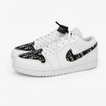 Custom Dior Jordan 1 Low white sneakers with black Dior inspired monogram toe panels and swooshes, main product image