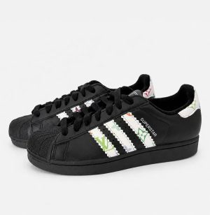 Custom Multi Color LV Black Superstar sneakers with black shell toes, black laces and white multicolor LV inspired side stripes, side pair view