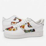 Custom Murakami Air Force 1 sneakers with colourful flower artwork on the side panels and toe boxes, side pair view